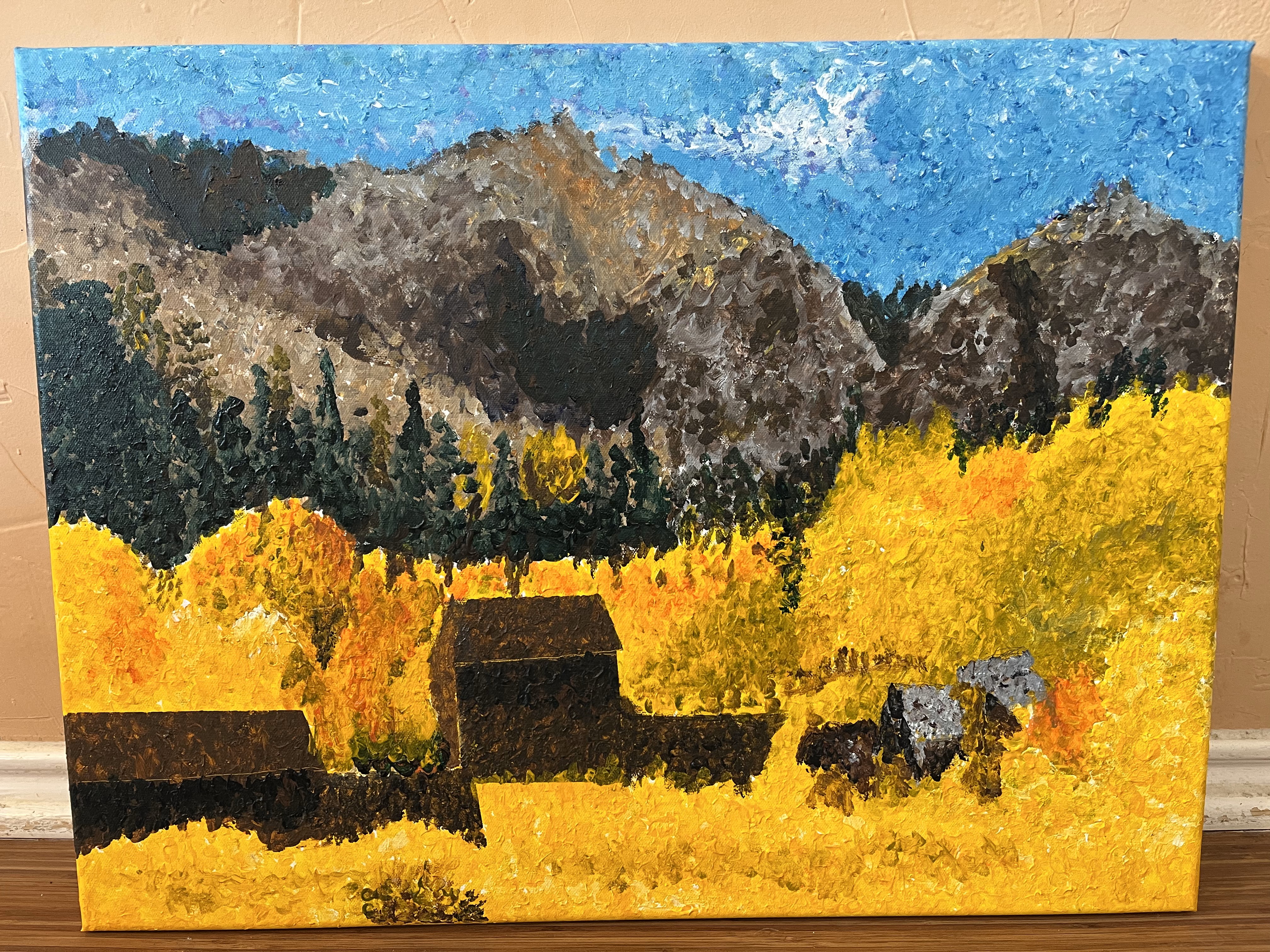 A group of aspens surrounding a farm